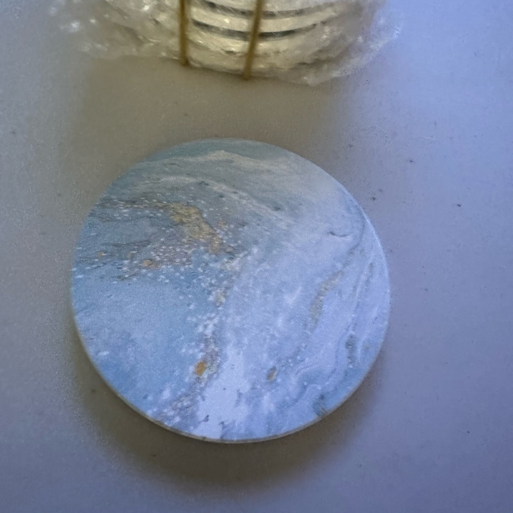 Stone gold and blue coasters with gold metal holder